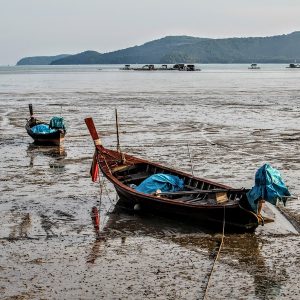 Thai Longtaol Boat and Low Tide